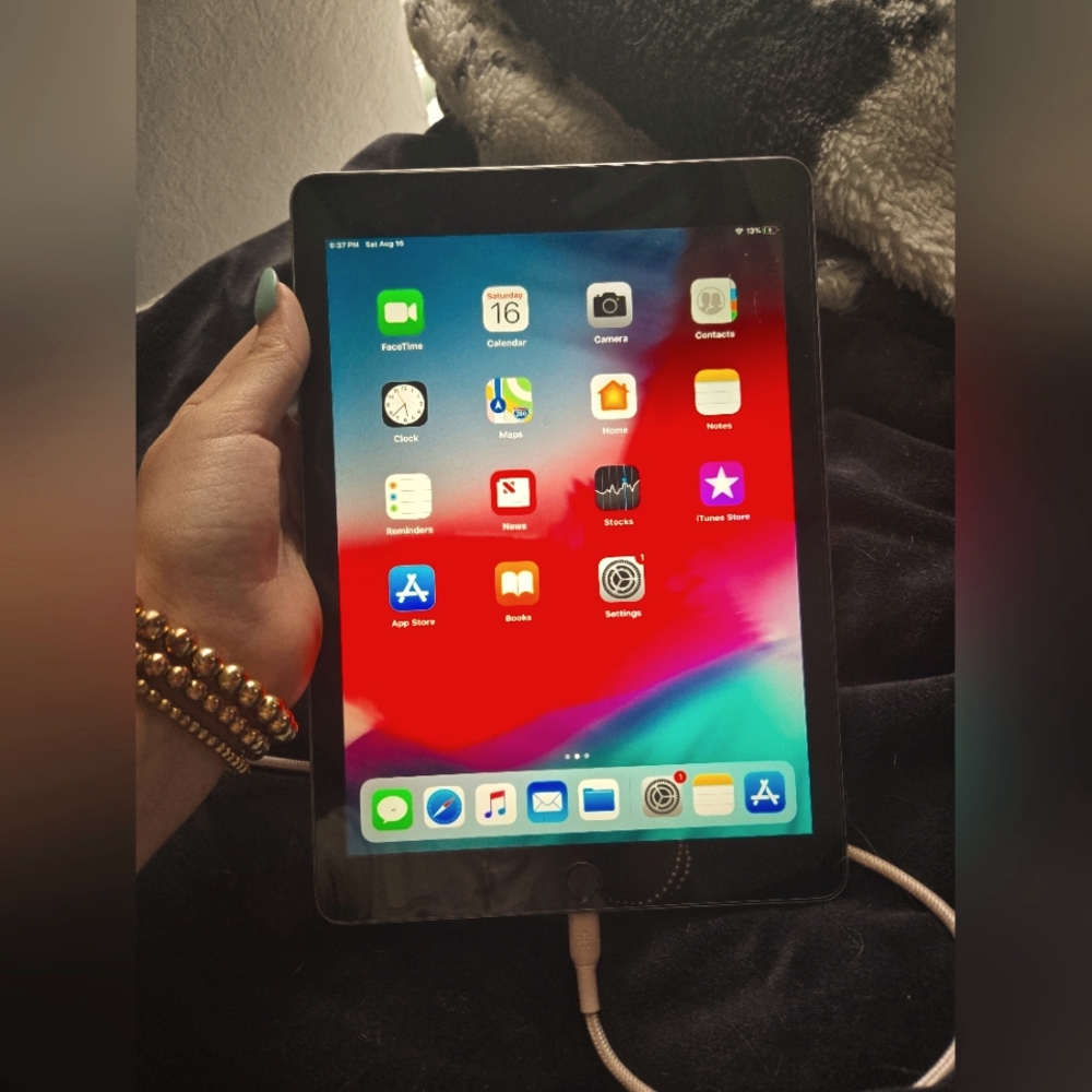 Apple iPad 5th Genetaction with Silver and Black Frame